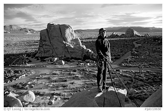 Climber getting ready to rappel down. Joshua Tree National Park (black and white)