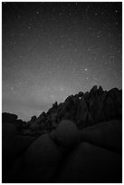 Marble rocks under clear starry sky. Joshua Tree National Park ( black and white)