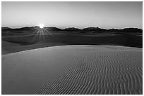 Sun setting over Andres Mountains. White Sands National Park ( black and white)