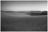 Dunes and mountains at dusk. White Sands National Park ( black and white)