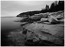 Pink granite slabs on the coast near Otter Point, sunrise. Acadia National Park ( black and white)