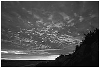 Sunset sky, Bass Harbor lighthouse. Acadia National Park, Maine, USA. (black and white)