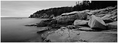 Rocky coastline with granite slabs. Acadia National Park (Panoramic black and white)