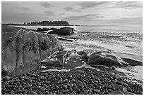 Seascape with pebbles, waves, and island, Schoodic Peninsula. Acadia National Park, Maine, USA. (black and white)