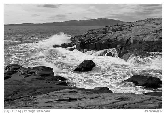 Wave, Schoodic Point, and Cadillac Mountain. Acadia National Park, Maine, USA.