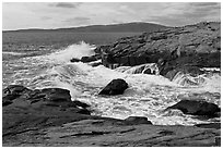 Wave, Schoodic Point, and Cadillac Mountain. Acadia National Park, Maine, USA. (black and white)