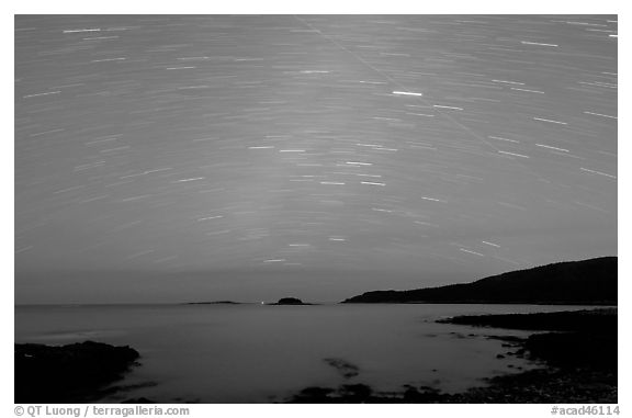 Star trails above coast, Schoodic Peninsula. Acadia National Park (black and white)