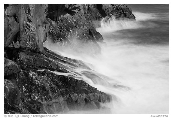 Fog-like water from long exposure at base of cliff. Acadia National Park, Maine, USA.