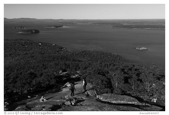 Hikers descending Champlain Mountain. Acadia National Park (black and white)