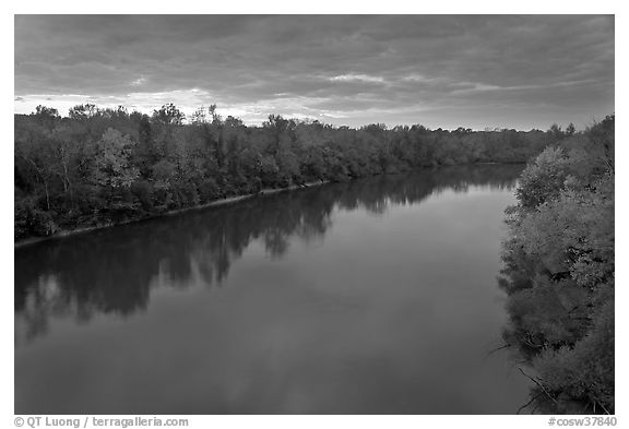 Congaree River under storm clouds at sunset. Congaree National Park, South Carolina, USA.