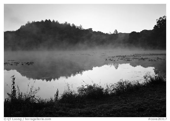 Mist raising from Kendall Lake at sunrise. Cuyahoga Valley National Park, Ohio, USA.