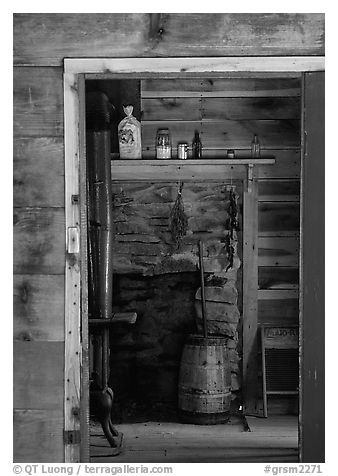 Room seen through doorway inside cabin, Cades Cove, Tennessee. Great Smoky Mountains National Park (black and white)