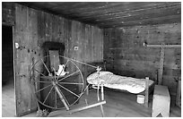 Cabin interior with rural historic furnishings, Cades Cove, Tennessee. Great Smoky Mountains National Park, USA. (black and white)