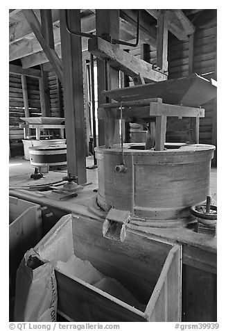 Turbine-powered grist stones inside Mingus Mill, North Carolina. Great Smoky Mountains National Park (black and white)