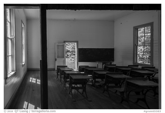 Old-style school desks inside  Beech Grove School, Cataloochee, North Carolina. Great Smoky Mountains National Park (black and white)