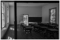 Old-style school desks inside  Beech Grove School, Cataloochee, North Carolina. Great Smoky Mountains National Park ( black and white)