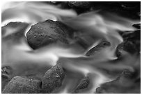 River flow and boulders covered with moss, Tennessee. Great Smoky Mountains National Park, USA. (black and white)