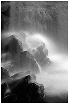 Misty water falling on dark rocks, Grotto falls, Tennessee. Great Smoky Mountains National Park, USA. (black and white)