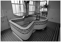 Tile-covered tub, Fordyce bathhouse. Hot Springs National Park, Arkansas, USA. (black and white)