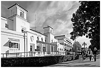 Bathhouse row with people strolling. Hot Springs National Park, Arkansas, USA. (black and white)