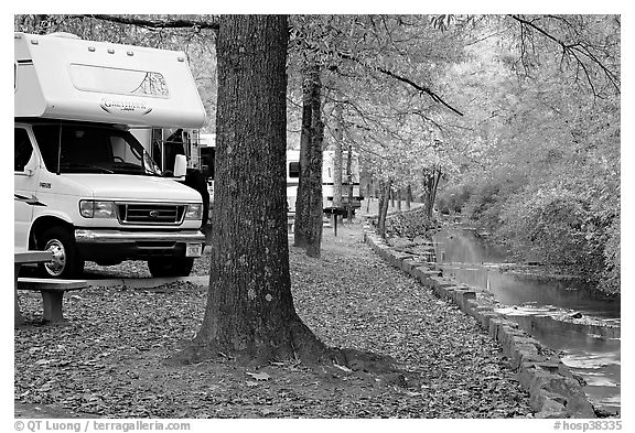 RV, trees in fall colors, and stream. Hot Springs National Park (black and white)