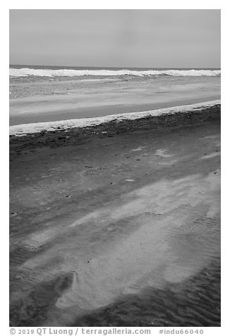 Sand beach, and ice in winter. Indiana Dunes National Park (black and white)
