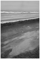 Sand beach, and ice in winter. Indiana Dunes National Park ( black and white)