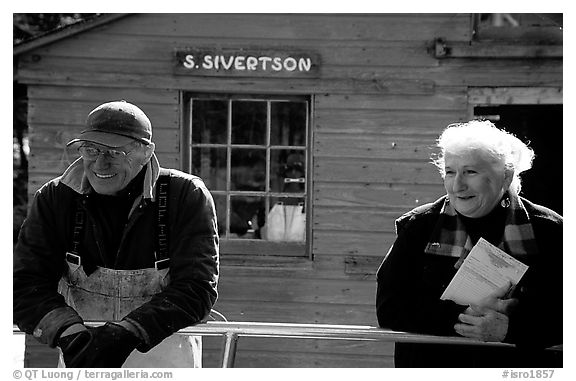 Commercial fishermen Milford and Monica Johnson at Sivertson Fish House. Isle Royale National Park (black and white)