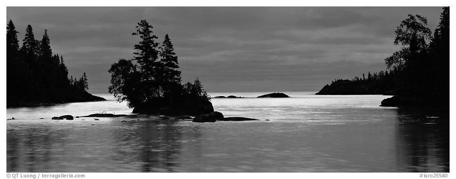 North woods lakescape with silhouetted trees. Isle Royale National Park (black and white)