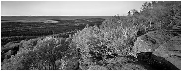Rocky bluff overlooking island with Lake Superior in the distance. Isle Royale National Park (Panoramic black and white)