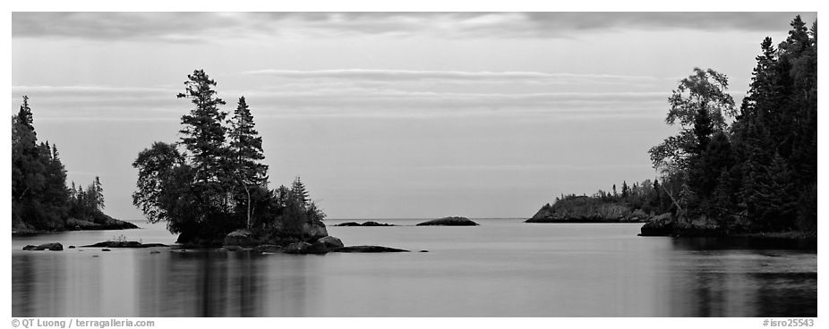 Tree-covered islet at dawn. Isle Royale National Park (black and white)