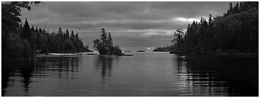 Cloudy sunrise on north woods lake. Isle Royale National Park (Panoramic black and white)