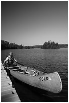 Canoist at dock, Tobin Harbor. Isle Royale National Park ( black and white)