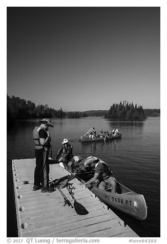 Canoists disembarking, Tobin Harbor. Isle Royale National Park (black and white)