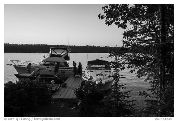 Dock with several boats moored, Tookers Island. Isle Royale National Park (black and white)