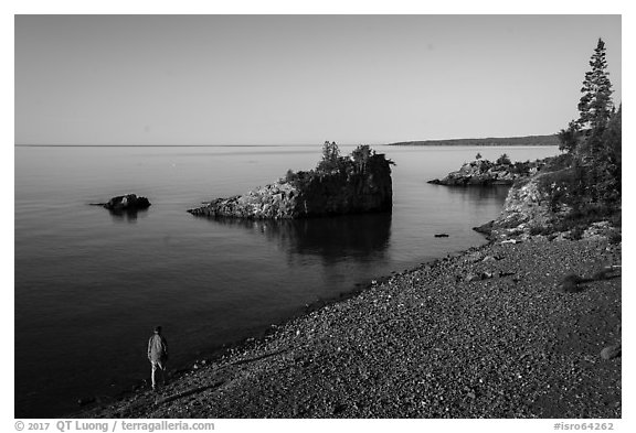 Visitor looking, Mott Island. Isle Royale National Park (black and white)