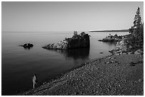 Visitor looking, Mott Island. Isle Royale National Park ( black and white)