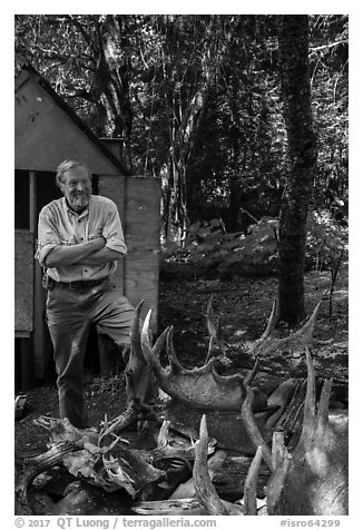 Rolf Peterson and moose skull and antlers collection. Isle Royale National Park (black and white)