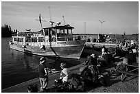 Backpackers wait to board ferry at Rock Harbor. Isle Royale National Park ( black and white)