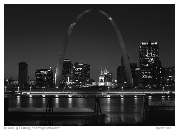 Arch and downtown skyline at night from East St Louis. Gateway Arch National Park (black and white)