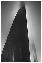 Profile view of Gateway Arch with top in clouds at night. Gateway Arch National Park ( black and white)