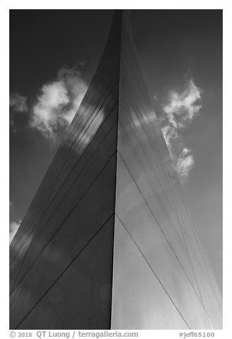 Symmetric view of Arch pillar base with sky. Gateway Arch National Park (black and white)