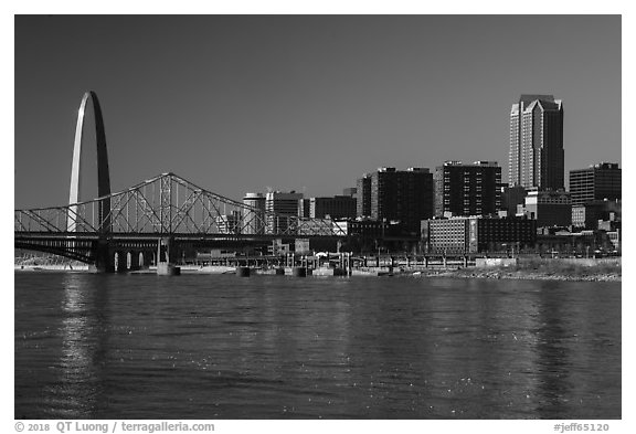 Arch, skyline, and bridges over Mississippi River. Gateway Arch National Park (black and white)