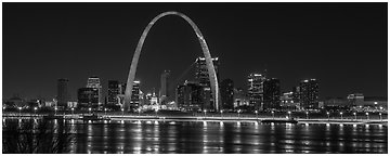 St Louis skyline across Mississippi River at night. Gateway Arch National Park (Panoramic black and white)
