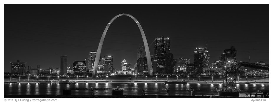 St Louis skyline from Mississippi River Overlook at night. Gateway Arch National Park (black and white)