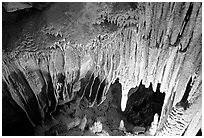 Stalagtites and stalagmites in the Frozen Niagara section. Mammoth Cave National Park, Kentucky, USA. (black and white)