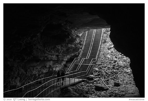 Visitors walk out of cave via historic entrance. Mammoth Cave National Park (black and white)