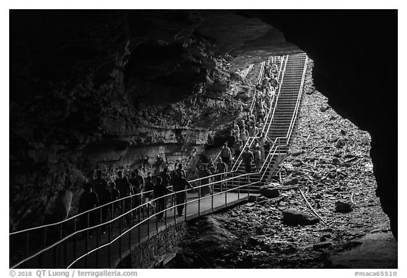 Many visitors waking into cave through historic entrance. Mammoth Cave National Park (black and white)