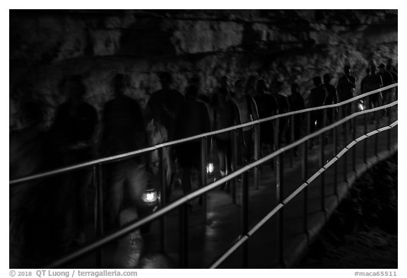 Motion blurred visitors holding lanterns. Mammoth Cave National Park (black and white)