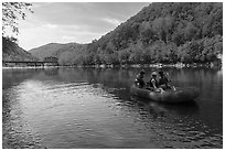 Rafters and historic Thurmond River Bridge. New River Gorge National Park and Preserve ( black and white)